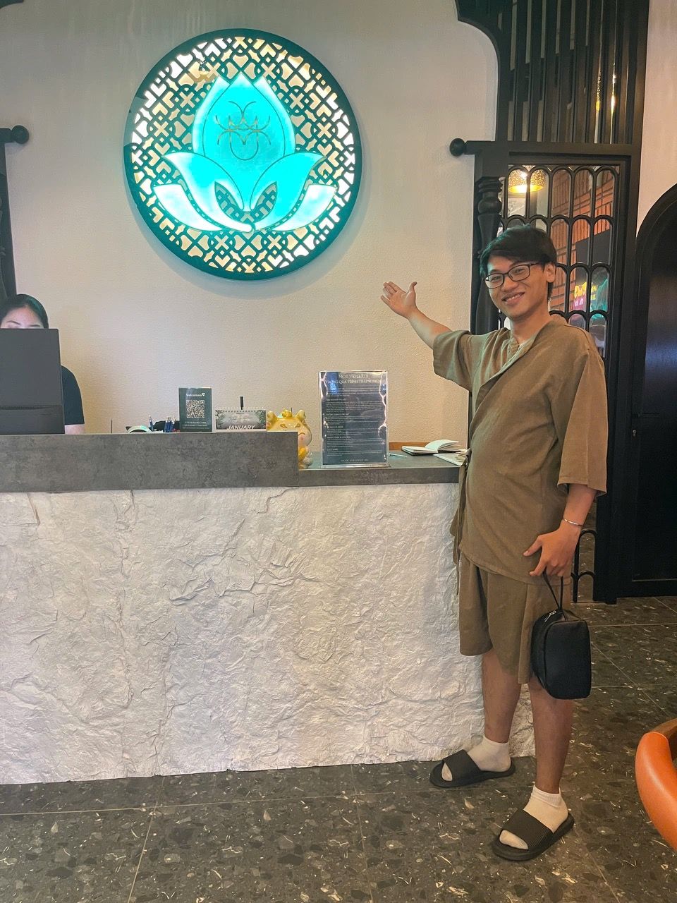 Tuan at the spa reception where his custom POS runs
