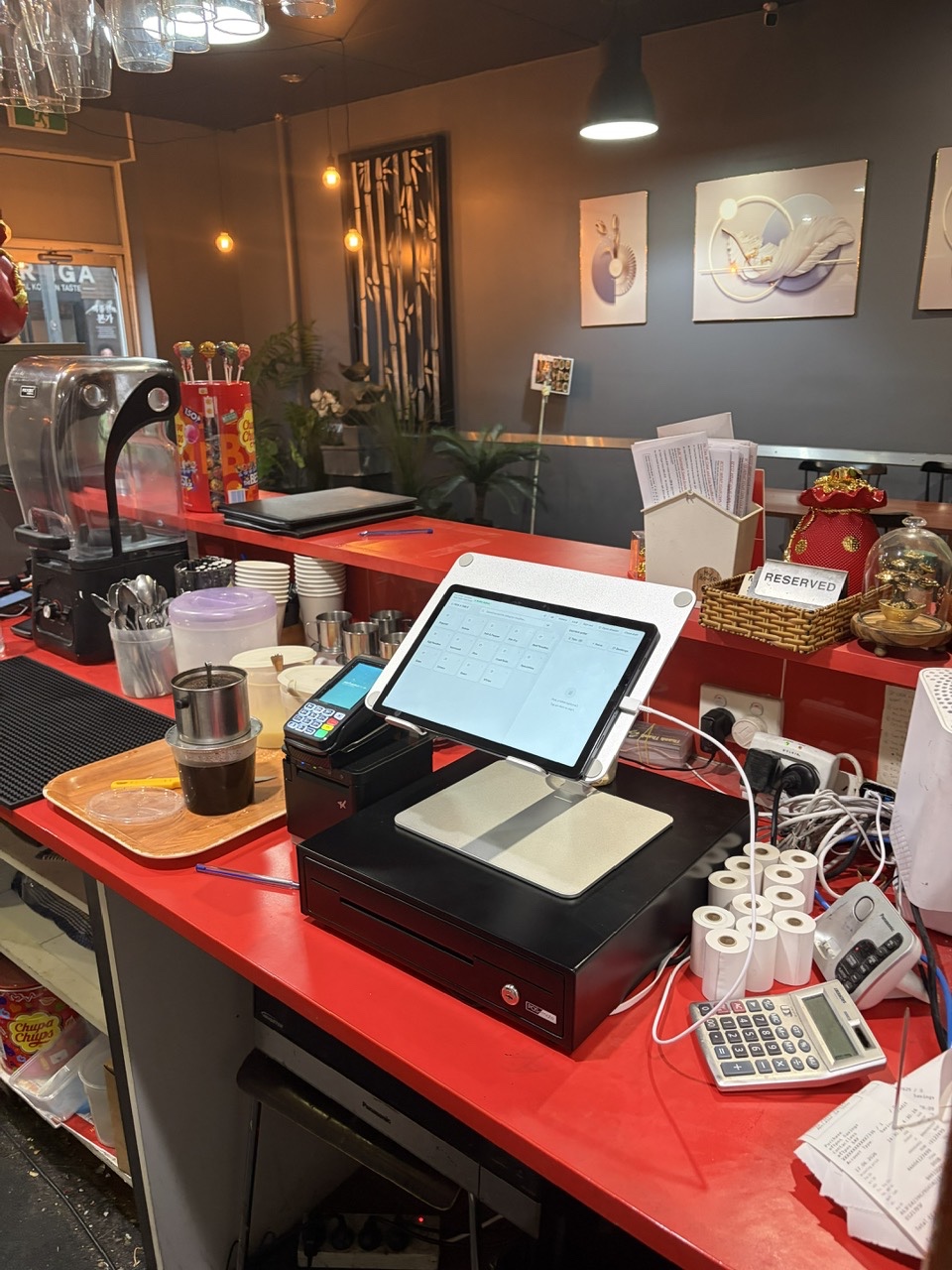 POS terminal with cash drawer and card reader set up on-site